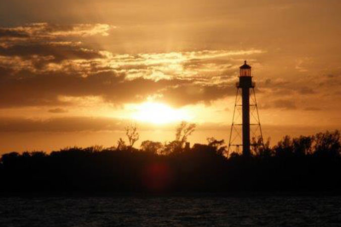 image of sunset Sanibel Lighthouse